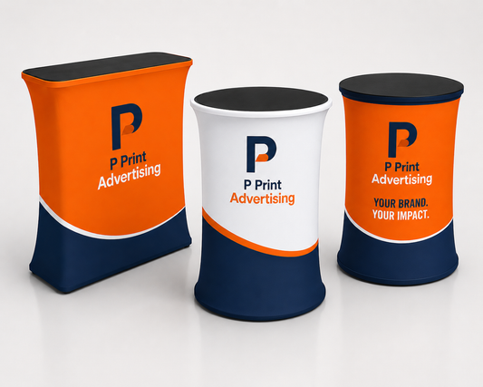 Three custom pop up tradeshow tables with tension fabric displays in orange, navy blue, white, and black color scheme, featuring P Print Advertising branding, arranged in a modern studio product mockup for exhibitions and promotional events